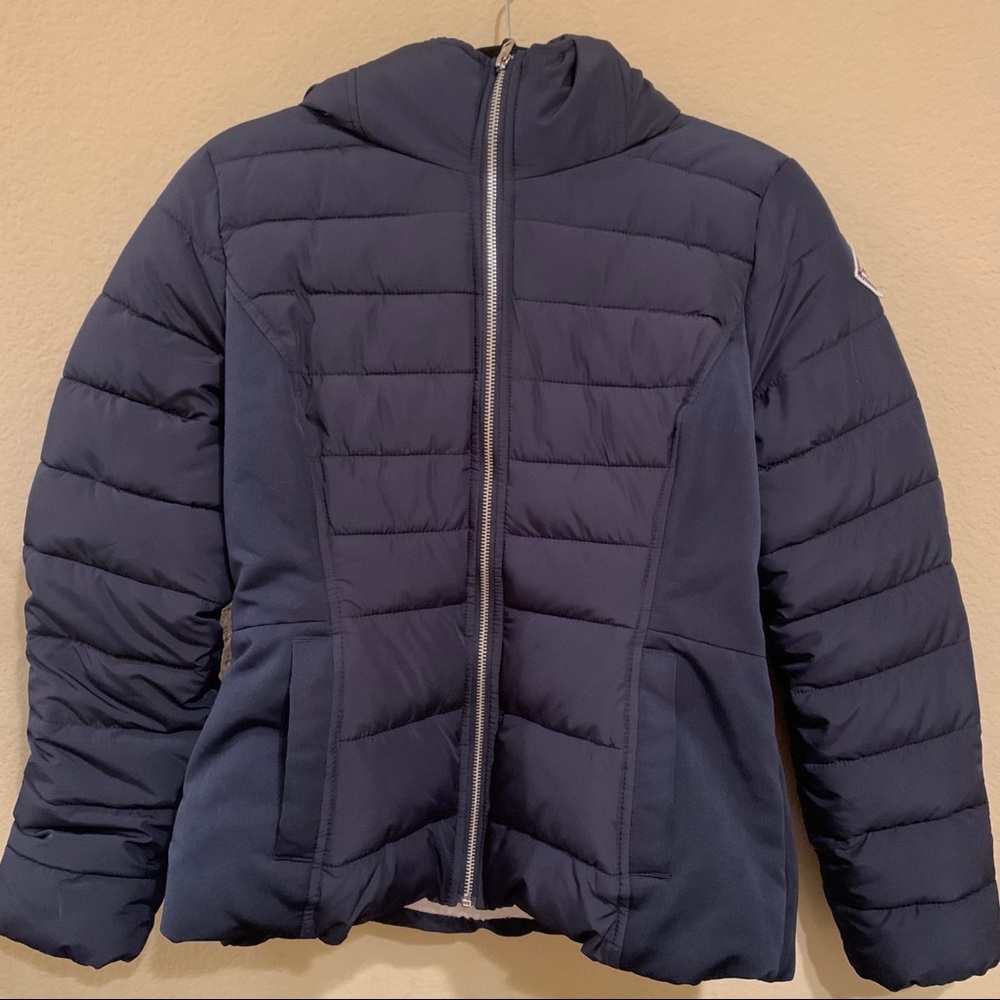 Navy blue sherpa-lined puff jacket